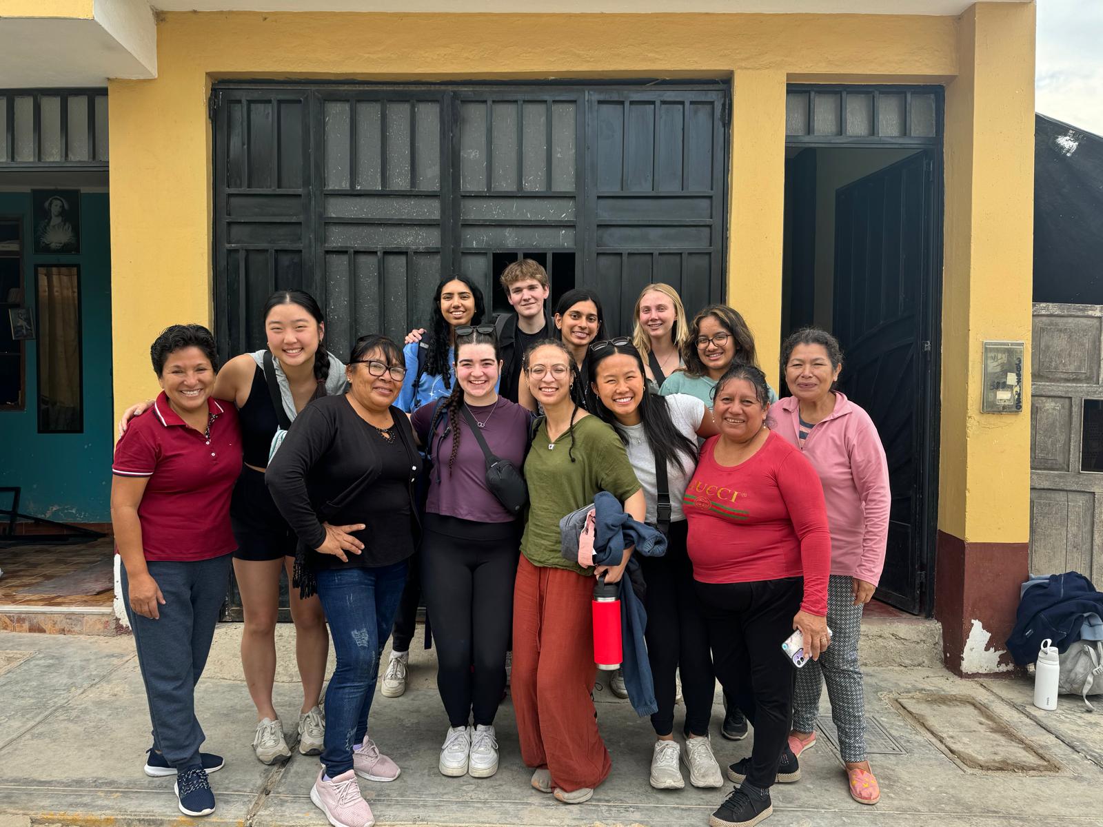 FNE International team with community members