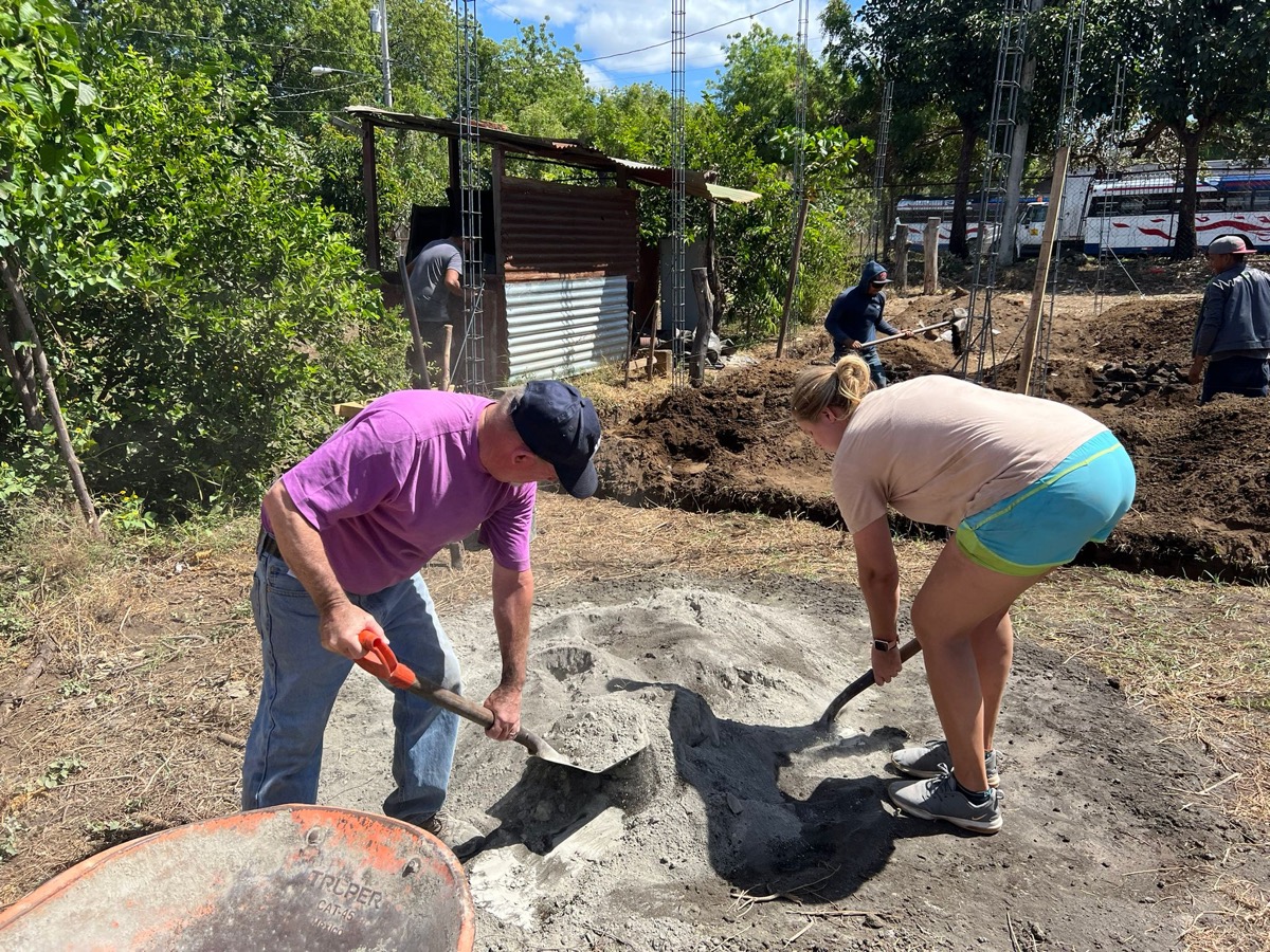 Volunteers working on housing construction