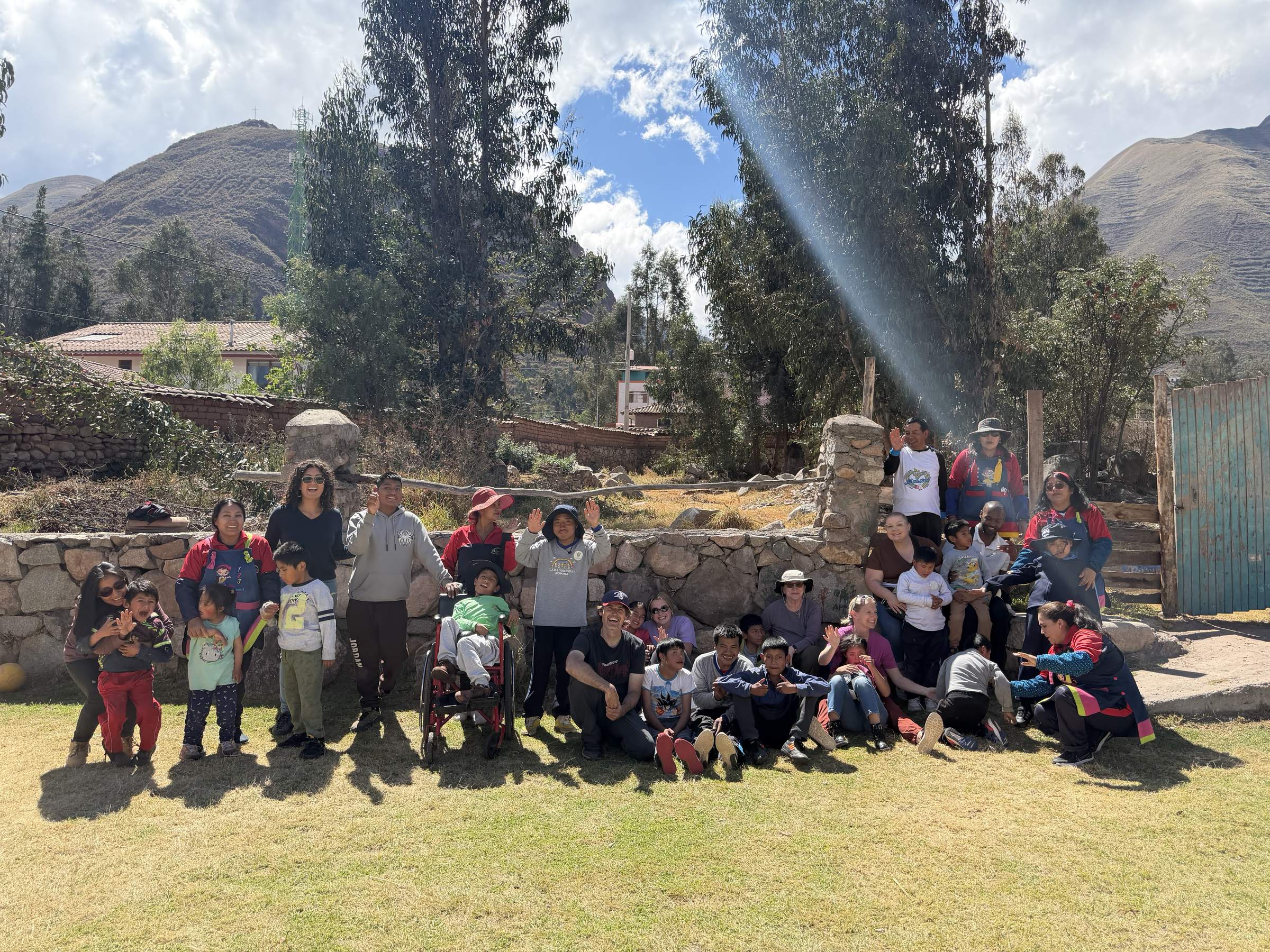 Community members and FNE volunteers gathered in the Peruvian Andes