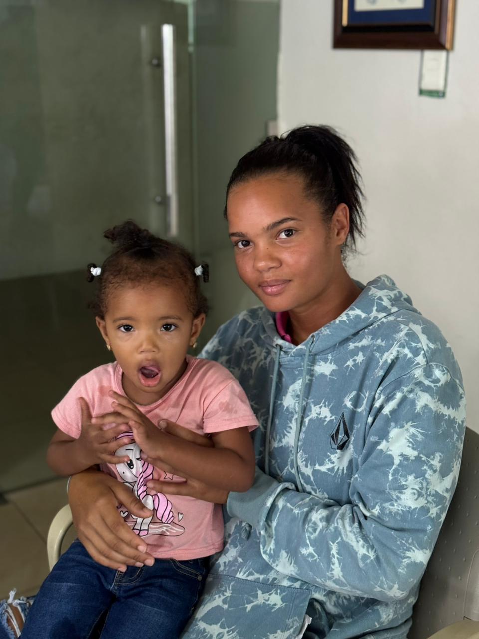 Mother and daughter at clinic