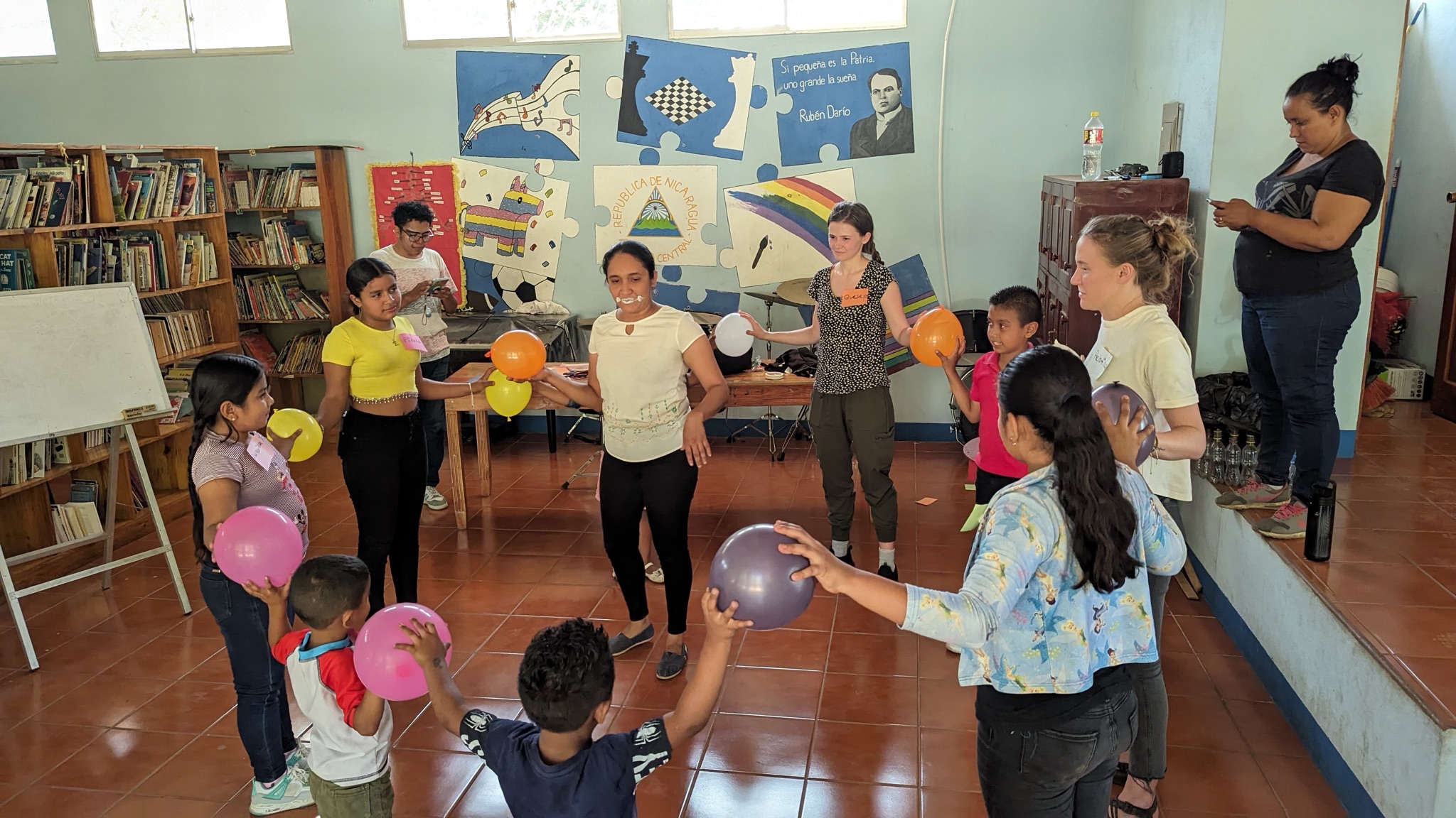 Interns leading activities with children